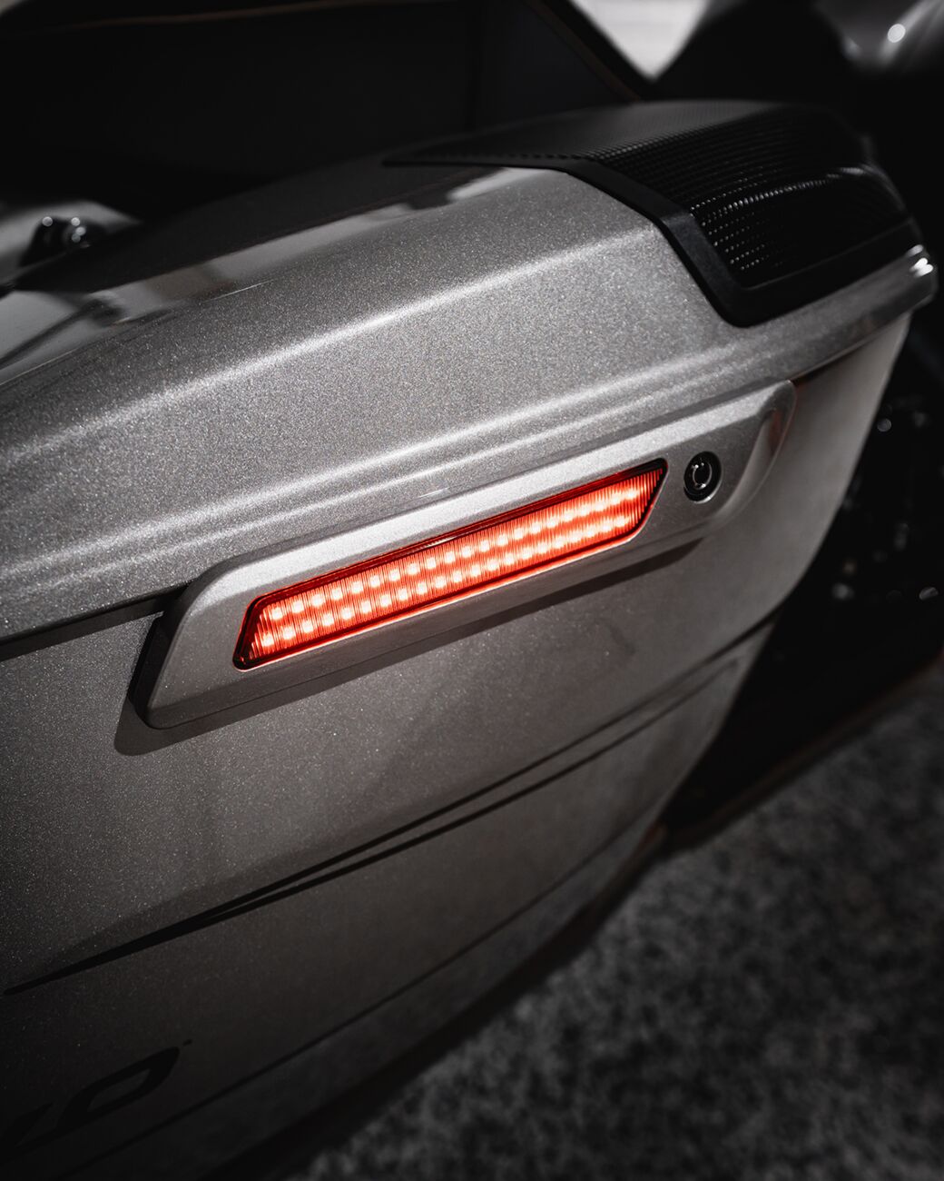Dual Color LED Saddlebag Latch Lights™, Smoked - 23+ Touring Auxiliary Light Custom Dynamics
