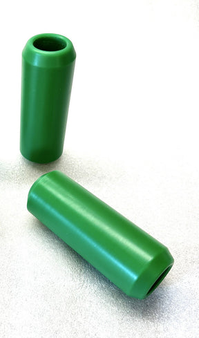 Smooth Pair Delrin Shock and Passenger Peg Slider, Green - 18+ M8 Softail Crash Bar Bung King