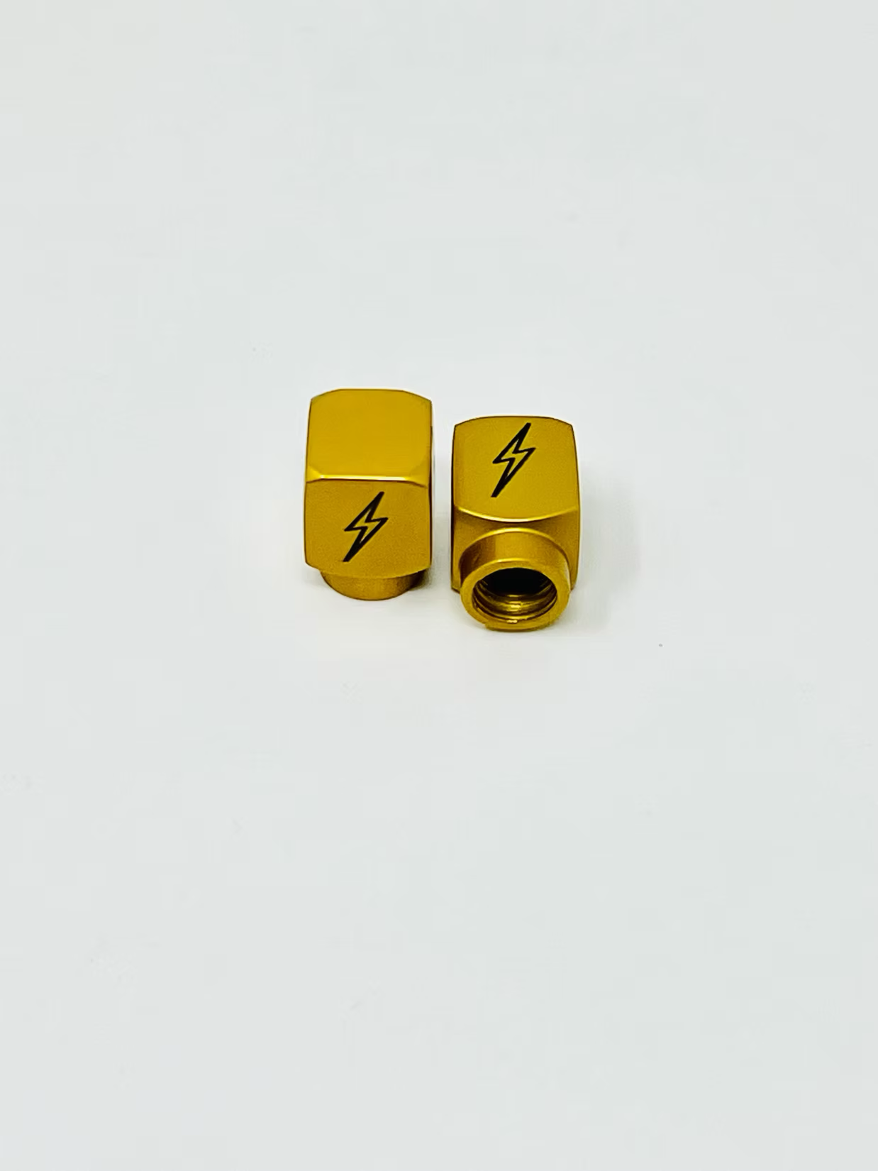 Long DMR Lightning Bolt Valve Stem Caps, OG Gold Valve Stem Caps Death Metal Racing