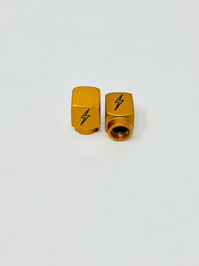 Long DMR Lightning Bolt Valve Stem Caps, Honey Gold Valve Stem Caps Death Metal Racing