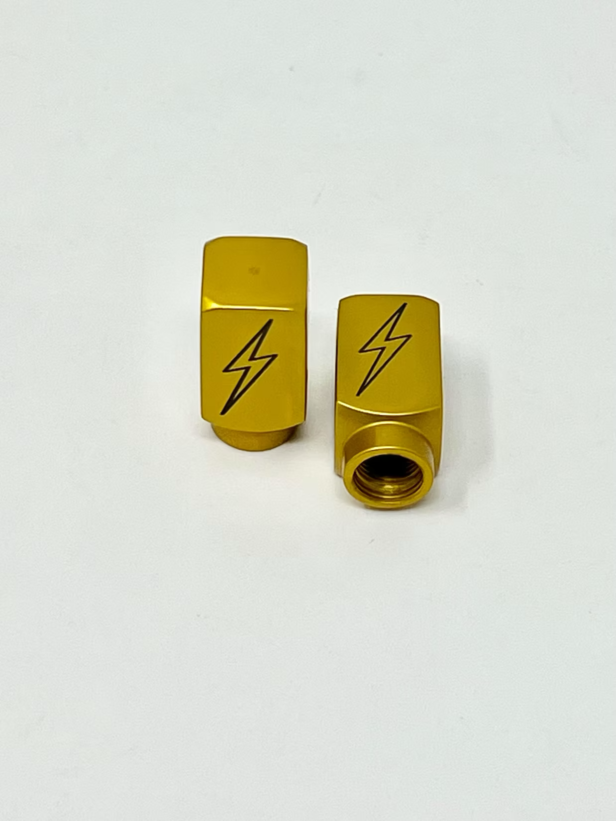 Long DMR Lightning Bolt Valve Stem Caps, OG Gold Valve Stem Caps Death Metal Racing